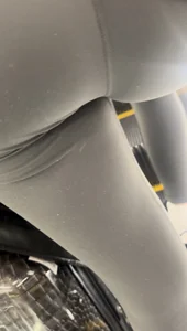 Tight curvy latina at airport pulls up pants