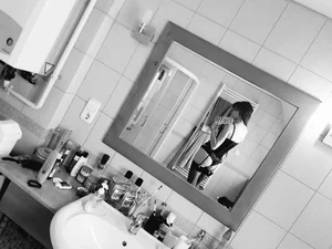 Girl in Stockings And Sexy Lingerie Mirror Selfie in Bathroom