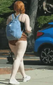 teen PAWG coed popping out of shorts