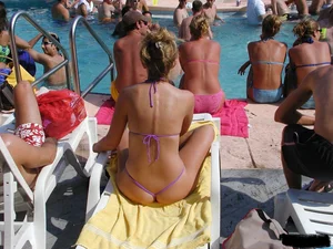 Beach voyeur girls in bikinis, thongs and topless