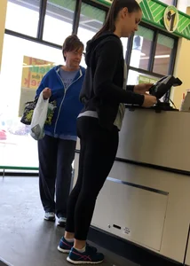 Thick booty girl shopping at Dollar Tree in leggings
