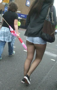 Candid cunny brunette in pantyhose and shorts showing her ass cheeks