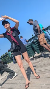 Very slim asian in black short legging. (VPL) OC
