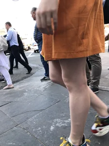 Cute Teen Girl in a Dress With Slim Legs Standing in the Subway Train, Then Crossing the Street Photo Gallery