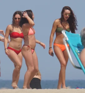 3 sexy girls on the beach in bikinis
