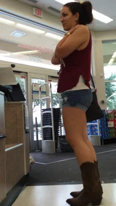 Jean shorts and cowboy boots at Walgreens