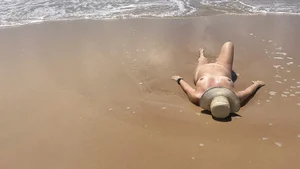Mature nudist at the beach
