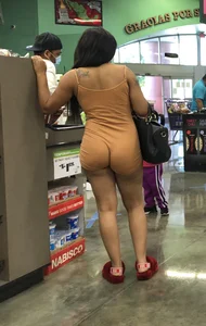 Latina with hard nipples and a big booty in tight spandex shorts outfit
