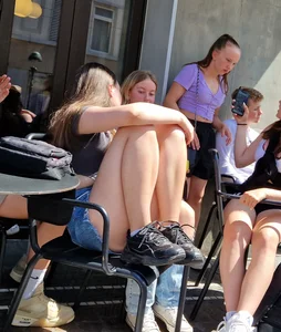 A Nice Candid Girl in a Top And Denim Shorts Hanging Out With Her Friends in a Street Cafe, Great Legs