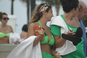 Saint Patrick's Day girls in bikinis at Deerfield Beach in Florida