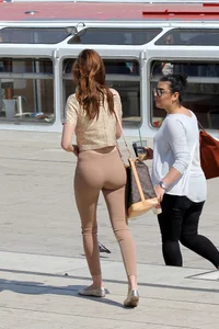 Redhead looking beautiful and sexy in tight pants with a nice ass and showing her panties