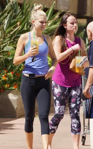Sexy blonde and friend walking in leggings