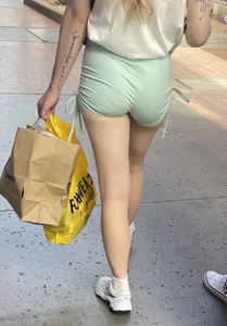 Sexy blonde in green shorts