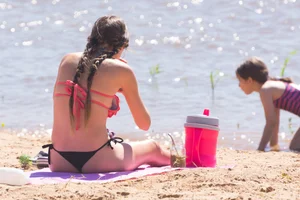 Candid beach girls in thongs