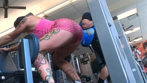 Hot tattooed gym babe in pink spandex shorts working out (part 2)