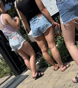Blonde in cut offs with friends