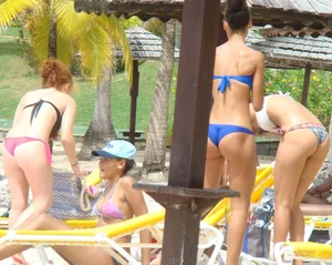 Amazing ebony ass in blue bikini with other sexy friends in bikinis