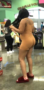 Latina with hard nipples and a big booty in tight spandex shorts outfit
