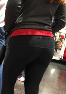Pretty girl shopping with boyfriend in leggings with a nice ass
