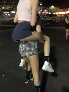 Girl in a Skirt Riding Another Girl in Shorts Hot Panties Flash Creepshot