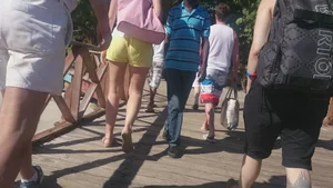 Milf in yellow shorts with vpl and a wedgie