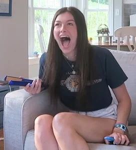 Cute Girl in Shorts Making Her Hair