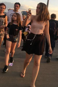 Braless beauty in tank top and skirt with puffy nipples