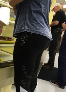 Nice round ass in leggings in line with no face