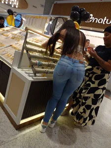 Brazilian Butt highest level. Tanlines peeking out of the Jeans