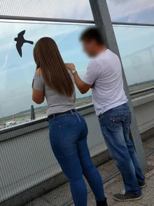 Big sexy ass in tight jeans at the airport