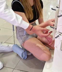 A Cute Young Candid Girl in Shorts And a Top at the Store