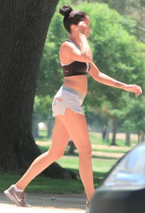 Ebony babe in Hooters shorts out for a run and walk
