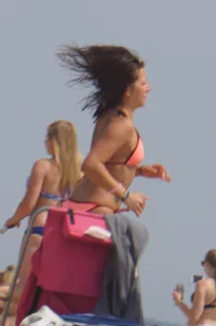3 sexy girls on the beach in bikinis