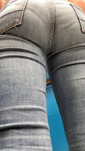 Girl with a nice ass in tight jeans and vpl up close