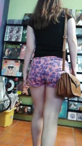Girl at the record store in shorts with a nice booty and vpl