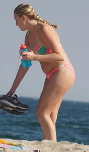 Thick blonde bikini babe on the beach