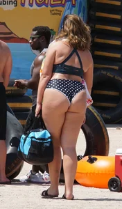 Girls in bikinis getting ready for tubing