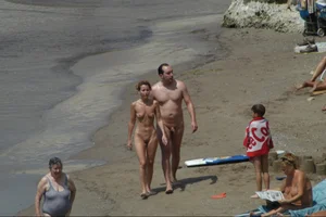 Girls on a nude beach in Sitges, Spain