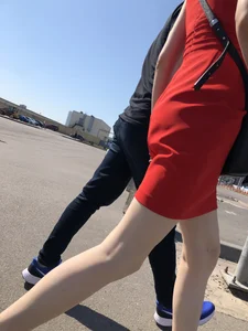 Girl in a Red Dress and Sandals With Thin, Pale Legs on the Crosswalk City Creepshots Gallery