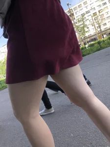 Awesome pale legs and booty in a skirt