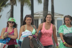 Saint Patrick's Day girls in bikinis at Deerfield Beach in Florida