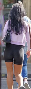 [It’s an older Milf, but it checks out] tight toned body showing off her ass, thigh gap & cameltoe in shiny shorts
