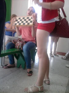 Girl in Mini Shorts and Sandals Candid