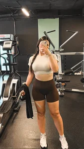 Gym hottie wearing a crop top and spandex shorts