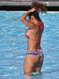 Hot ass milf with an amazing body at the pool