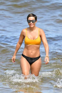 Frankie Bridge nip slips in a bikini on the beach