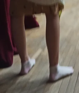 Skinny Legs And Feet in White Socks of a Teen Candid Girl in a Dress