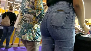 Jewelry vendor in light blue jeans