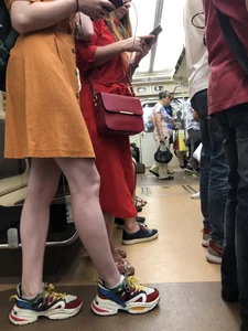 Cute Teen Girl in a Dress With Slim Legs Standing in the Subway Train, Then Crossing the Street Photo Gallery