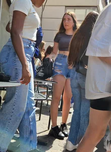 A Nice Candid Girl in a Top And Denim Shorts Hanging Out With Her Friends in a Street Cafe, Great Legs